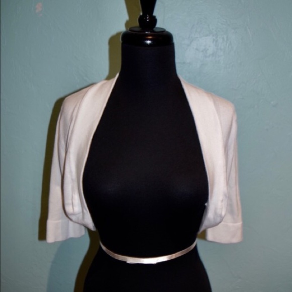 B. Darlin White Shrug Sweater